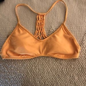 Yellow swim suit top with crochet back detail